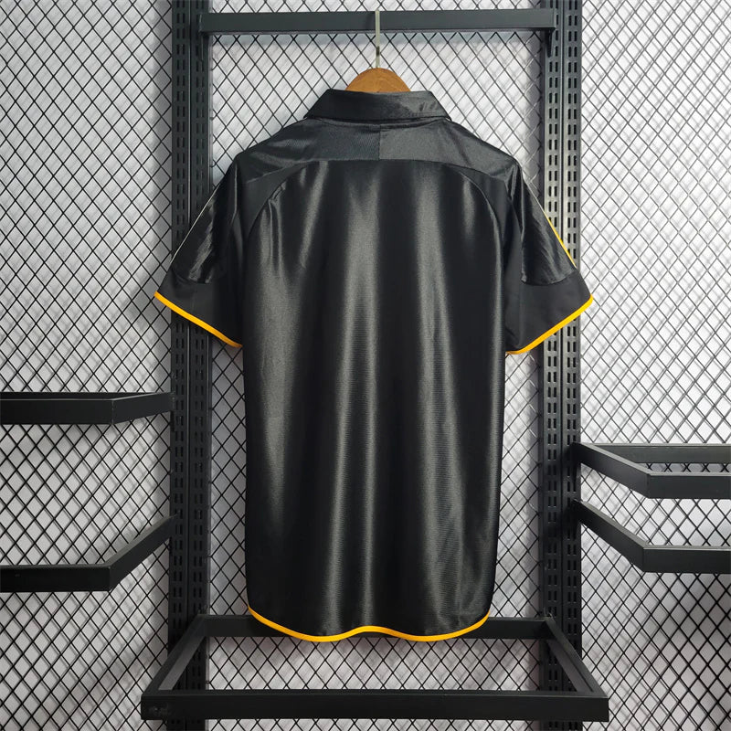 Maillot Real Madrid Rétro Homme 1998/1999 – Extérieur Noir/ Or