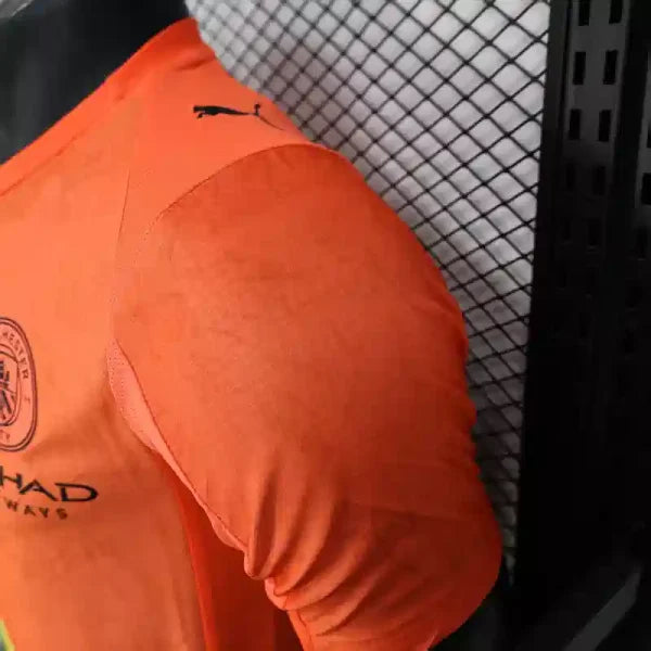 Maillot Manchester City FC 2025/2026 – Maillot Second Extérieur Homme (Orange à Bande Diagonale, Version Joueur)