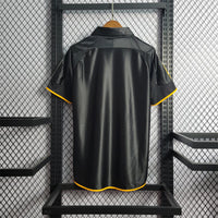 Maillot Real Madrid Rétro Homme 1998/1999 – Extérieur Noir/ Or