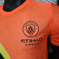 Maillot Manchester City FC 2025/2026 – Maillot Second Extérieur Homme (Orange à Bande Diagonale, Version Joueur)
